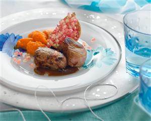 Filete de cerdo con granada y zanahoria. Receta disponible.