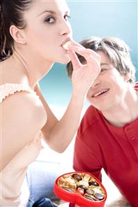 couple eating chocolates