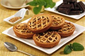 Tartaletas con crema de chocolate y sésamo. Receta disponible.