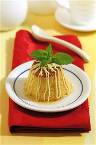 Flan de pera con chocolate blanco. Receta disponible.