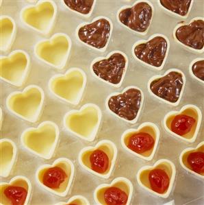 Making chocolates: making cherry truffle hearts