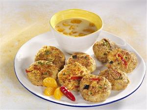 Curry burgers with coconut and mandarin sauce