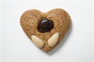 Gingerbread heart with almonds