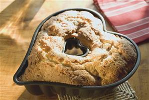 Heart-shaped cake in the baking tin