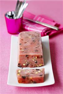 Watermelon sorbet with chocolate chips and pistachio nuts