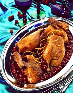 Duck a l' orange on cherry sauce