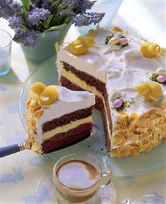 Easter cake with marzipan chicks, white coffee beside it (3)