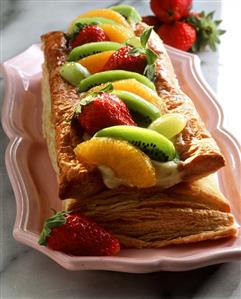 Puff pastry slice with cream filling and fresh fruit