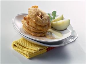 Apple fritters with warm vanilla sauce
