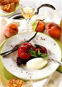 Spiced port wine peaches with cinnamon dairy ice cream