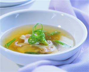 Clear spring onion soup with shrimps
