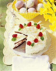 Strawberry tiramisu gateau, white chocolate curls for Easter