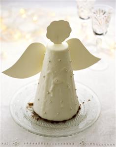 Chocolate cake with white icing, Christmas angel