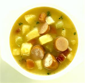 Potato soup with slices of sausage