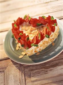 Heart-shaped strawberry and cream gateau