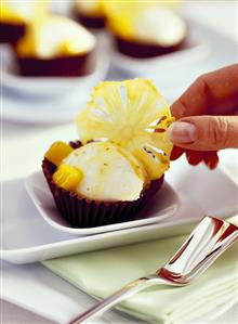 Coconut mousse with mango sauce and candied pineapple