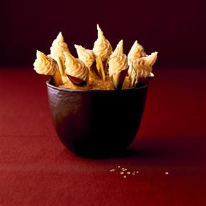 White chocolate cones in chocolate bowl