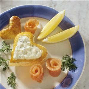 Puff pastry heart with herb quark filling, salmon roll & dill