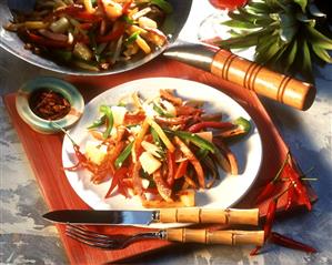Pan-cooked chili potato dish with sausage and pineapple