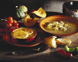 Pumpkin soup with toasted white bread, broth with dumplings