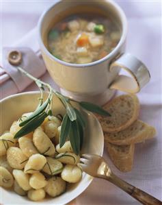 Gnocchi with sage butter, vegetable broth with rice, baguette