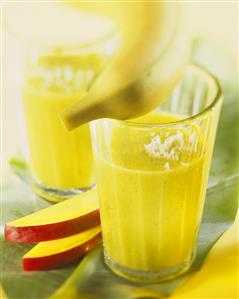 Banana drink with kiwi fruit and grated coconut