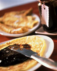 Pancakes with damson puree