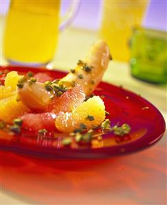 Fruit cooked on hot stone with pistachios