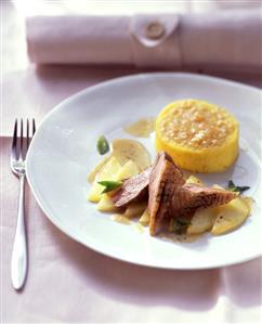 Duck breast with polenta gratin and minted apple sauce
