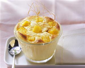 Mango and quark pudding with vanilla and caramel strands