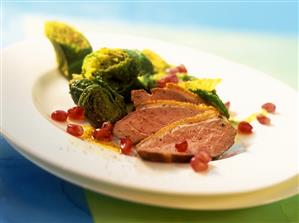 Duck and savoy salad with pomegranate seeds