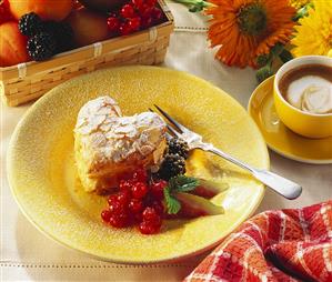 Puff pastry heart with berries and fig