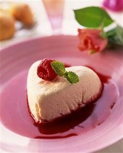 Ricotta heart on raspberry sauce