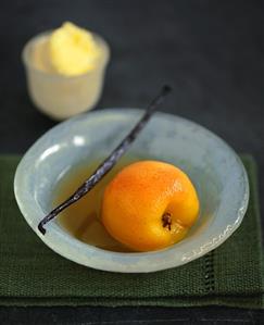 Poached apricot with vanilla and clotted cream