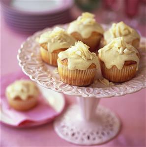 White chocolate muffins on cake stand
