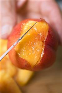 Peeling a nectarine