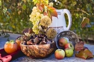 Sweet chestnuts, grapes, persimmons, apples & autumn leaves