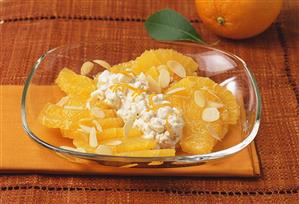 Dish of sliced oranges with almonds