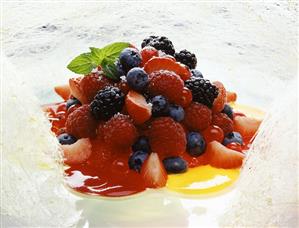 Berry dessert surrounded by candyfloss