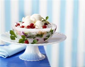 Lemon sorbet in an ice bowl with roses