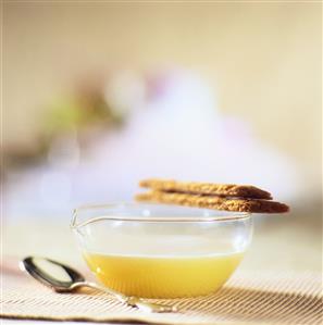 Cold apple soup with ginger biscuits