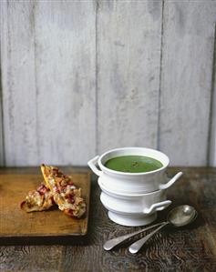 Spinach and watercress soup with cheese on toast