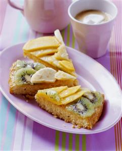 Exotic fruit cake with coconut macaroon base