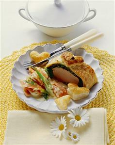 Pork fillet with herbs in puff pastry, with creamy carrots