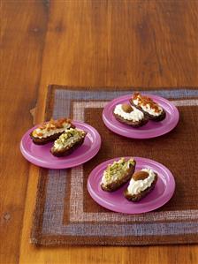 Stuffed dates on three plates