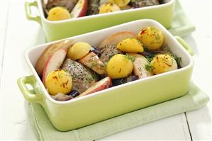 Pork with apples, potato balls and saffron threads
