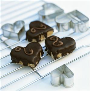 Heart-shaped biscuits with chocolate icing