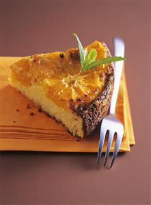 A piece of orange chocolate cake