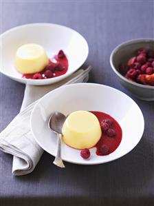 Orange panna cotta with raspberry sauce