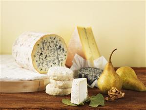 Cheese still life with pears and walnut